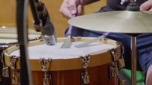 Playing Drums with Brushes in Sound Recording Studio