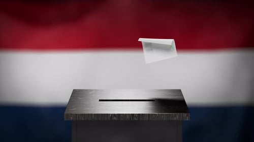 Legislative elections in the Netherlands. A ballot paper is placed in a ballot box during elections