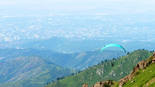 Paraglider in the Mountains