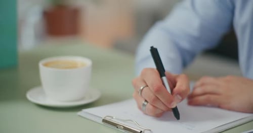 Hand Writing on Paper with Coffee