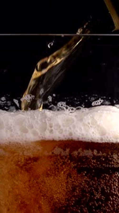 Slow Motion Pours of Beer Showcase Foam and Bubbles at 1000 Fps in a Bar Setting