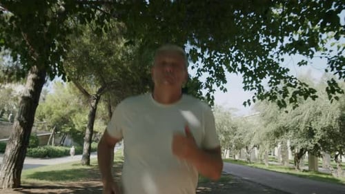 Senior Male Running in Park