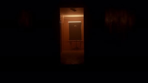 Silhouetted Figure Running in Dark Hallway at Night