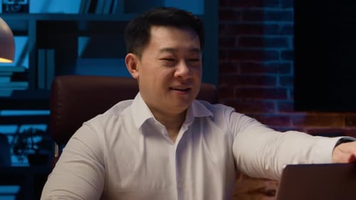 Successful Man Relaxes After Finishing Computer Work