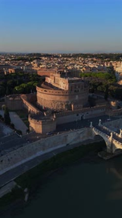 Stunning Aerial View of Castel SantAngelo in the Heart of Rome During a Beautiful Sunset