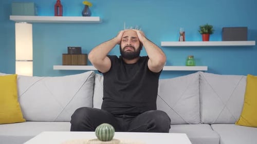 Sad man is crying.
