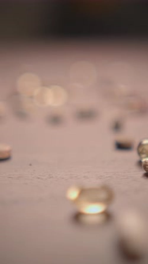 A Detailed Closeup View of Various Pills and Tablets Arranged on a Surface for Examination