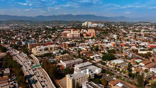 Beautiful scenery of sunny Los Angeles, California, USA. Hazy silhouette of mountain range