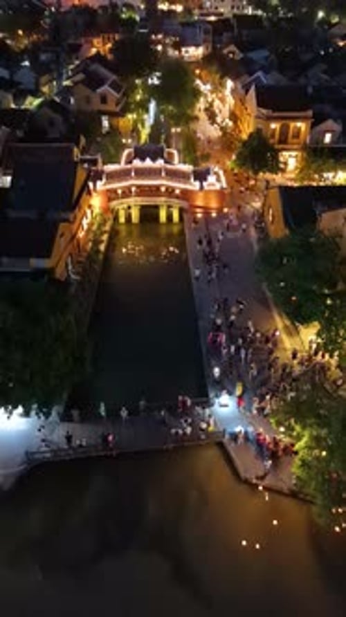 Aerial view of Chua Cau or Japanese Covered ancient Bridge in night