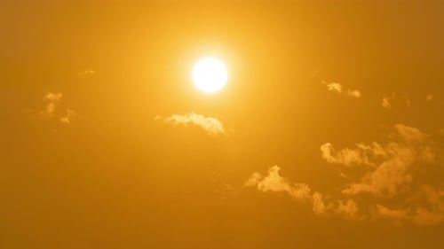 Golden Sunset with Moving Clouds