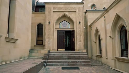 Wooden doors for the entrance to Muslim mosque for prayers of people of the faith of Islam