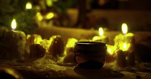 Flickering Candles with Warm Light and Bokeh Background