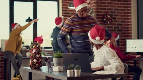 Holiday Gift Exchange at Decorated Business Office