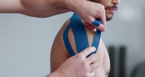 Physiotherapy, shoulder plaster and man patient with sport massage therapist at clinic