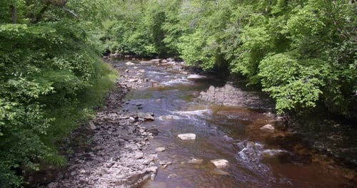 Extra wide shot looking up the river swale, at keld, Swaledale