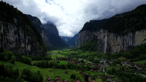 4k Drone Aerial Shot Of Famous Staubbach Waterfall In Lauterbrunnen Village With Impressive Vast Gla