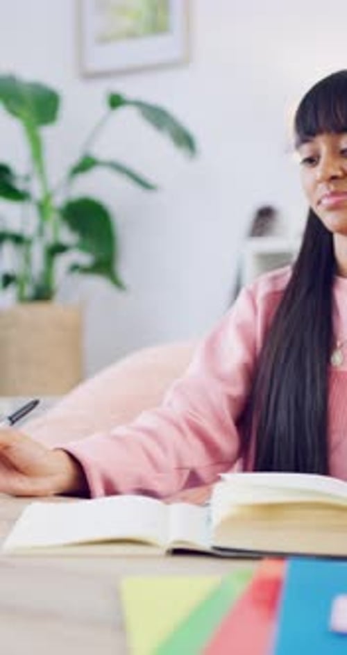 Education, face and teen with books in home, growth and writing homework with textbook and learning