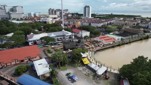 Aerial drone of an old ship in Malacca Malaysia during a cloudy day lock track right shot