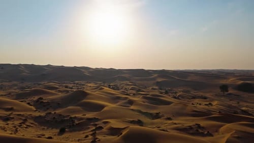 Drone View of Sunset Over Sand Dunes in Dubai Desert