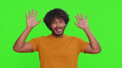 Young Adult Making Silly Faces on Green Screen