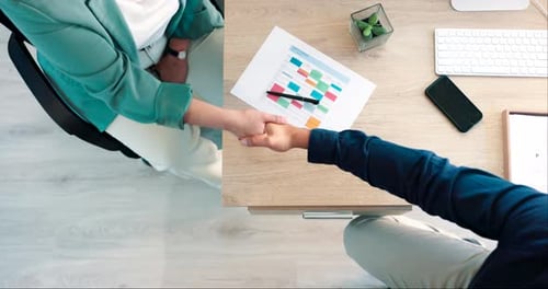 Business people, top view or shaking hands for job interview, partnership or collaboration