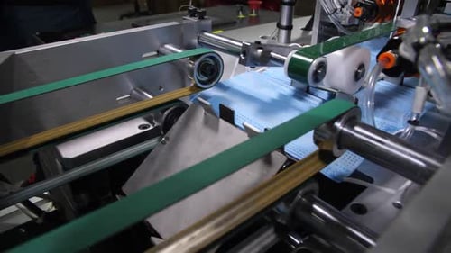 Production Line Transports Finished Surgical Masks in Shop