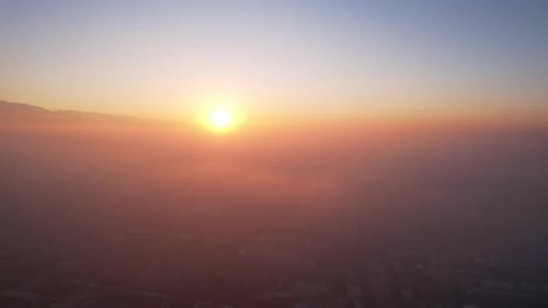Epic Gray Smog is Visible at Sunset Over the City