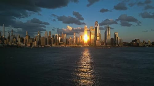 Sunrise in NYC New York City Skyline with Dramatic Sky Skyscrapers in NYC Near Dramatic Clouds New