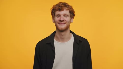 Man Smiling and Laughing with Red Hair
