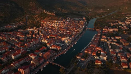 Aerial view of historic UNSESCO town Bosa in Sardinia, Italy at sunset
