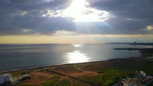 Beautiful sunset over the sea in the city.