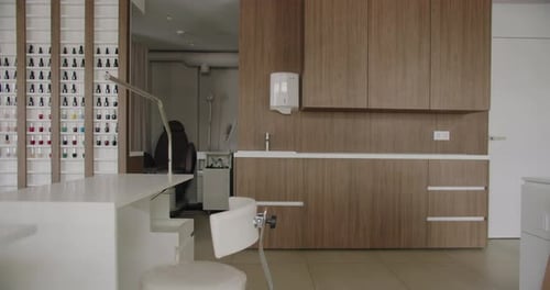 Empty Nail Salon Interior with Manicure Stations