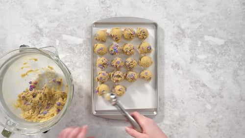 Flat Lay Scooping Cookie Dough with a Dough Scoop to Bake Unicorn Chocolate Chip Cookies
