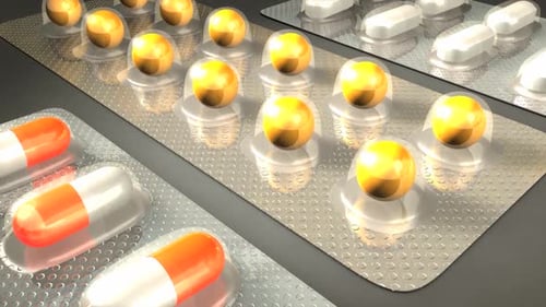 Blisterpackungen mit Kapseln und sphärischen Pillen