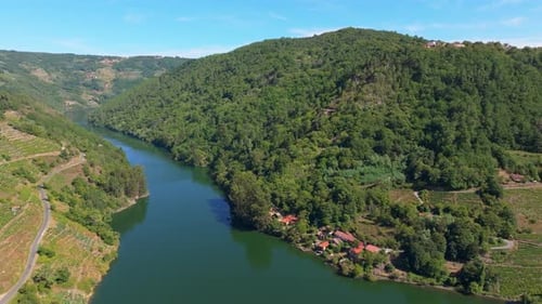 Coastal Village And Forested Mountains At Belesar In Lugo, Galicia, Spain. Aerial Drone Shot