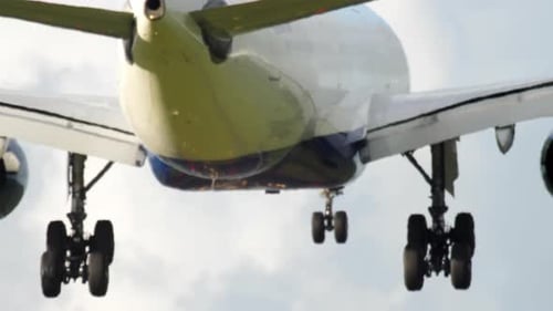 Airliner Flies Overhead Landing