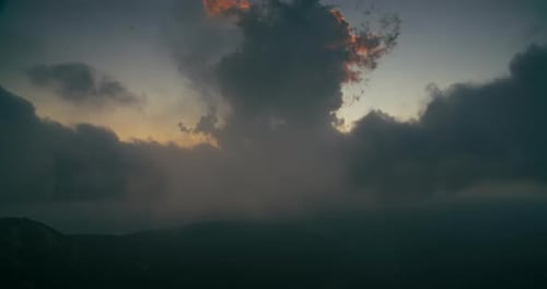 Cloudscape Timelapse at Sunset on Mountain Travel Shot Over Cumulonimbus Clouds