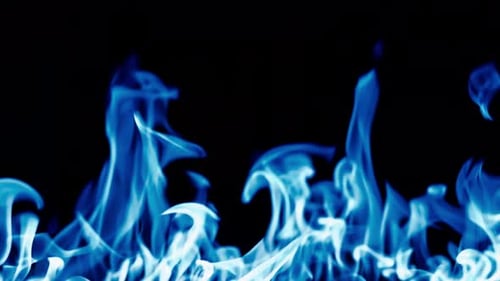 Abstract Electric Blue Flames Dance on Black Backdrop
