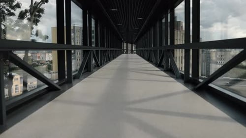 Camera Moves Through an Enclosed Pedestrian Skyway