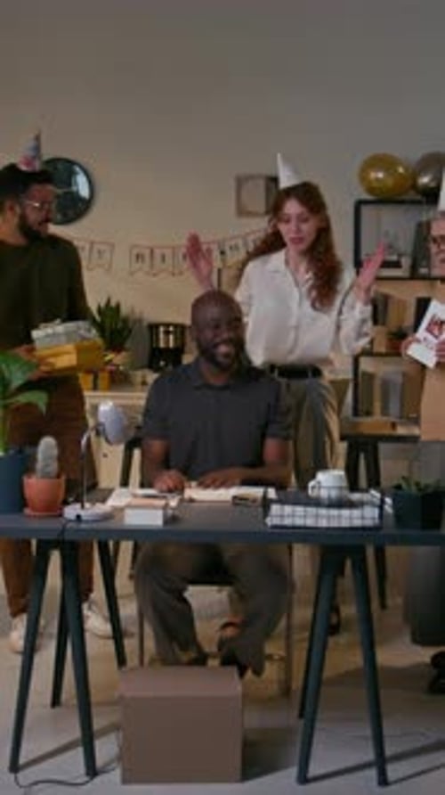 Friends Celebrating Birthday With Party Hats and Gifts