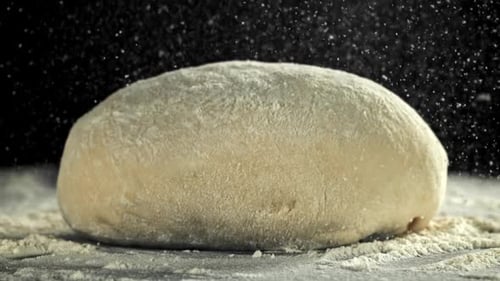 Flour Falls on the Dough Filmed on a Highspeed Camera at 1000 Fps