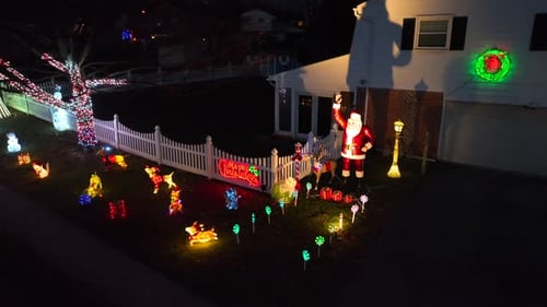 Festive Christmas Lights Display at Suburban Home at Night