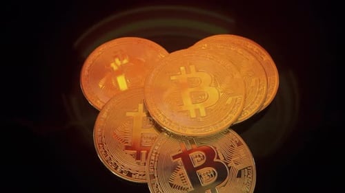 Gold Bitcoins Stacked in Close Up Shot