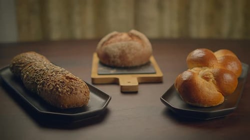 Assorted Fresh Bread on a Wood Table