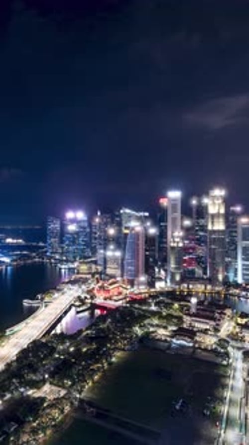 Time lapse of the Singapore skyline at night. Vertical Video.