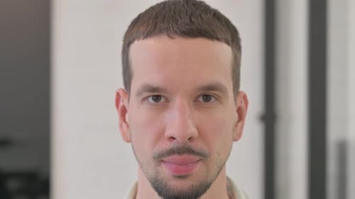 Close up of Serious Young Man Face
