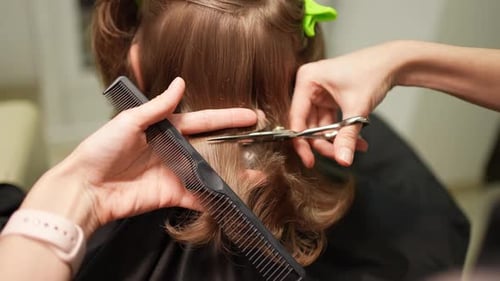 Child Getting Haircut at Home