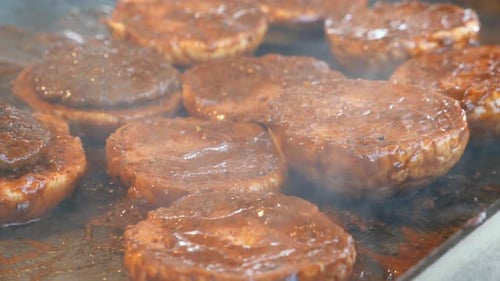 Meatballs Roasting in Pan Making Burger at Street