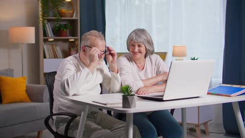Senior Couple Enjoying a Video Call at Home