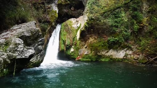 Beautiful Waterfall in Green Wild Forest Top Aerial View